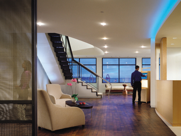 Main Reception Area in Water Quadrant, View Toward Seating Area, Stair and Check-in Kiosk