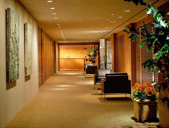 Main Corridor to Board Room with Artwork and Seating Area
